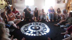 We can't quite create the atmosphere of a workshop like this one with Philip and Stephanie in Germany. However, but with a little imagination we can create a virtual circle in which to explore the Druidcraft Tarot.