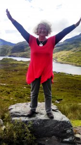 Linda Marson on top of the world in the Scottish Highlands.
