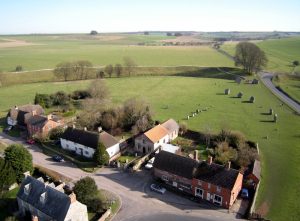 An aerial shot of the village of Avebury with some of the stones - taken from the camera mounted under the red balloon!